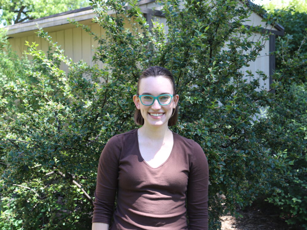 An outdoor portrait of Kate Haynes